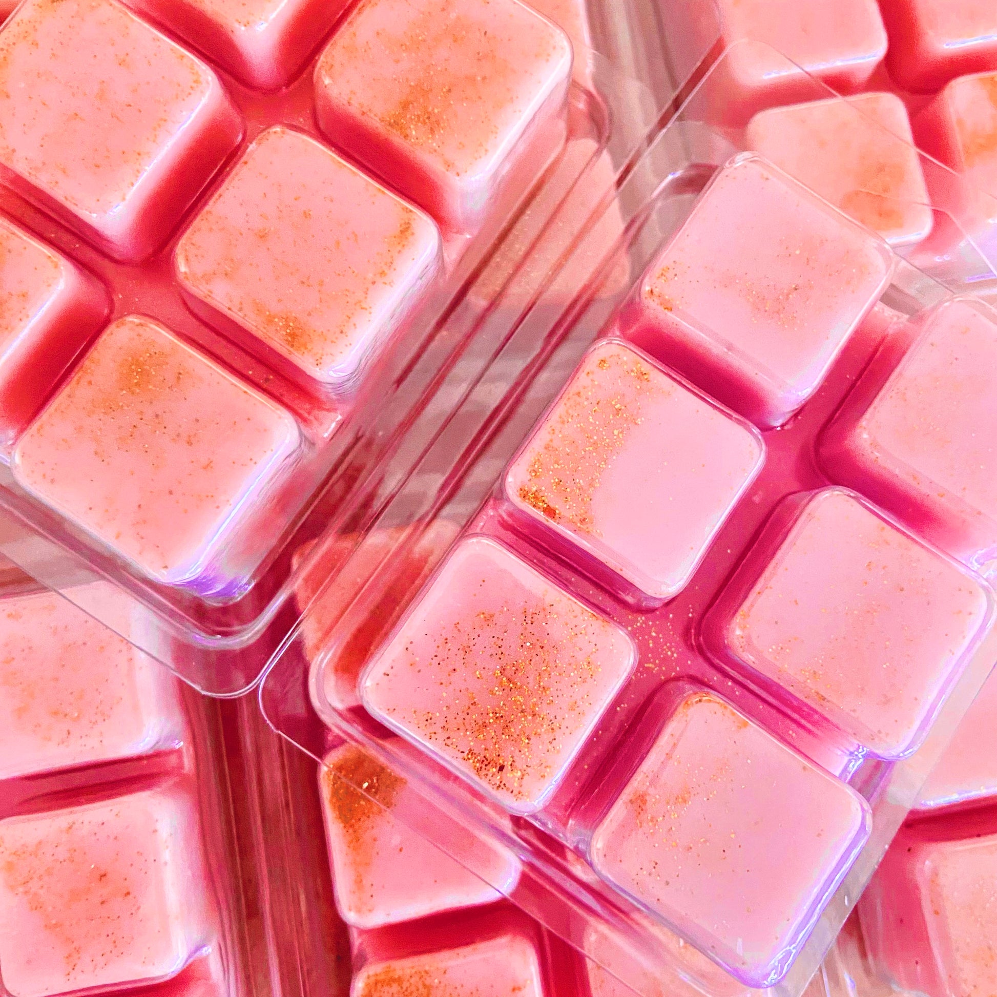 Pink glittery Sleepy Bedtime Baby Wax Melt Snap Bar in clear plastic packaging by The Soap Gals.
