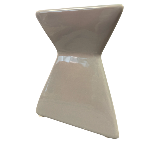 A ceramic hourglass-shaped vase with a glossy finish, designed as a Triangle Grey Gloss Wax Melt & Oil Warmer, isolated on a black background by The Soap Gal x.