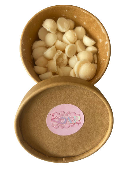 A bowl of The Soap Gal x Wax Melt Scoopies 460g with a label on it, designed for use in a burner to enhance room scent.