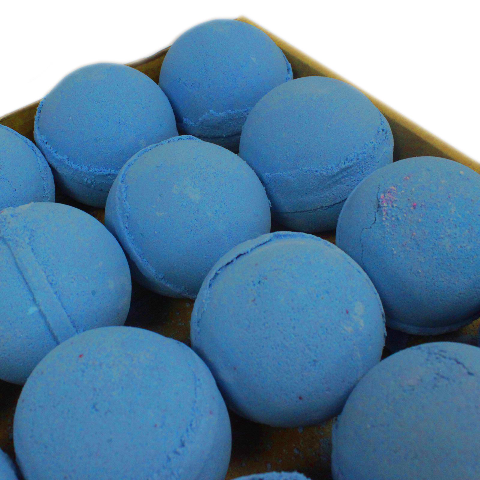A close-up of blue macarons arranged tightly together, evoking the masculine scent of Texas Dewberry Jumbo Bath Bomb from The Soap Gal x.