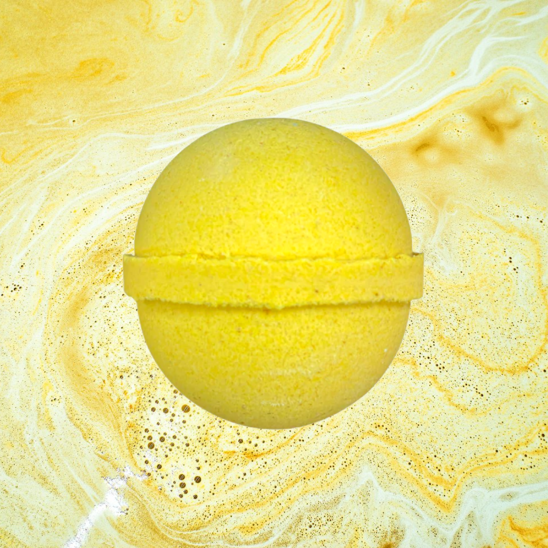 Yellow foamy Foamy Banana Bath Bomb from The Soap Gals dissolving in water with fizzing foam, suitable for vegans.