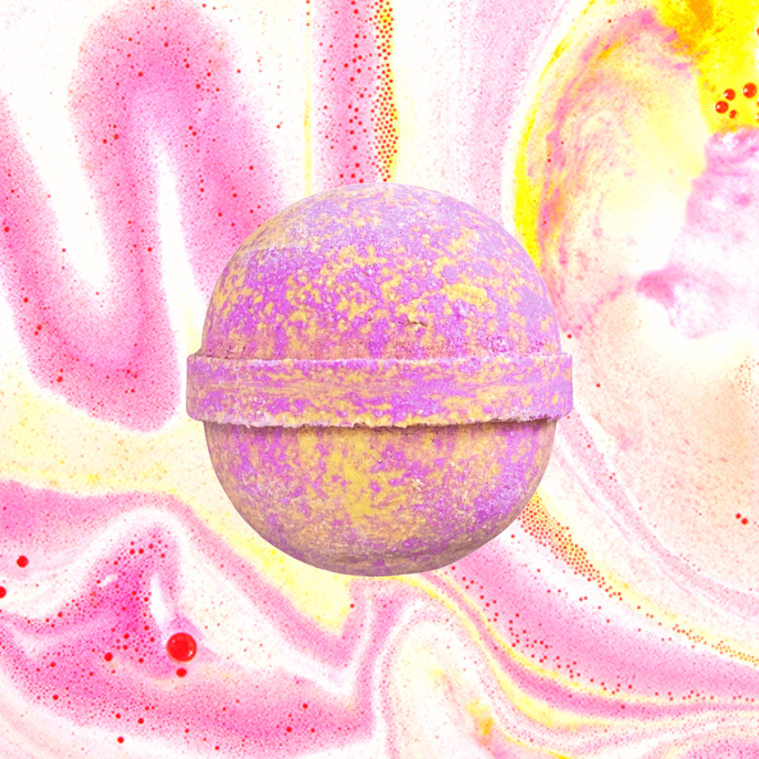 A cruelty-free Ice Pixie Perfume Inspired Bath Bomb by The Soap Gals on a vibrant, abstract watercolor background.
