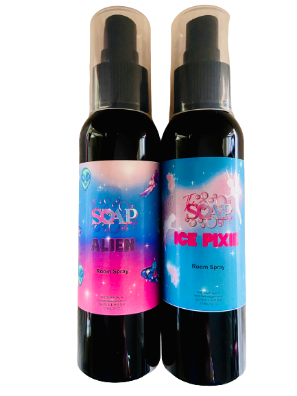 Two bottles of The Soap Gals' Inspired Room Sprays on a black background.