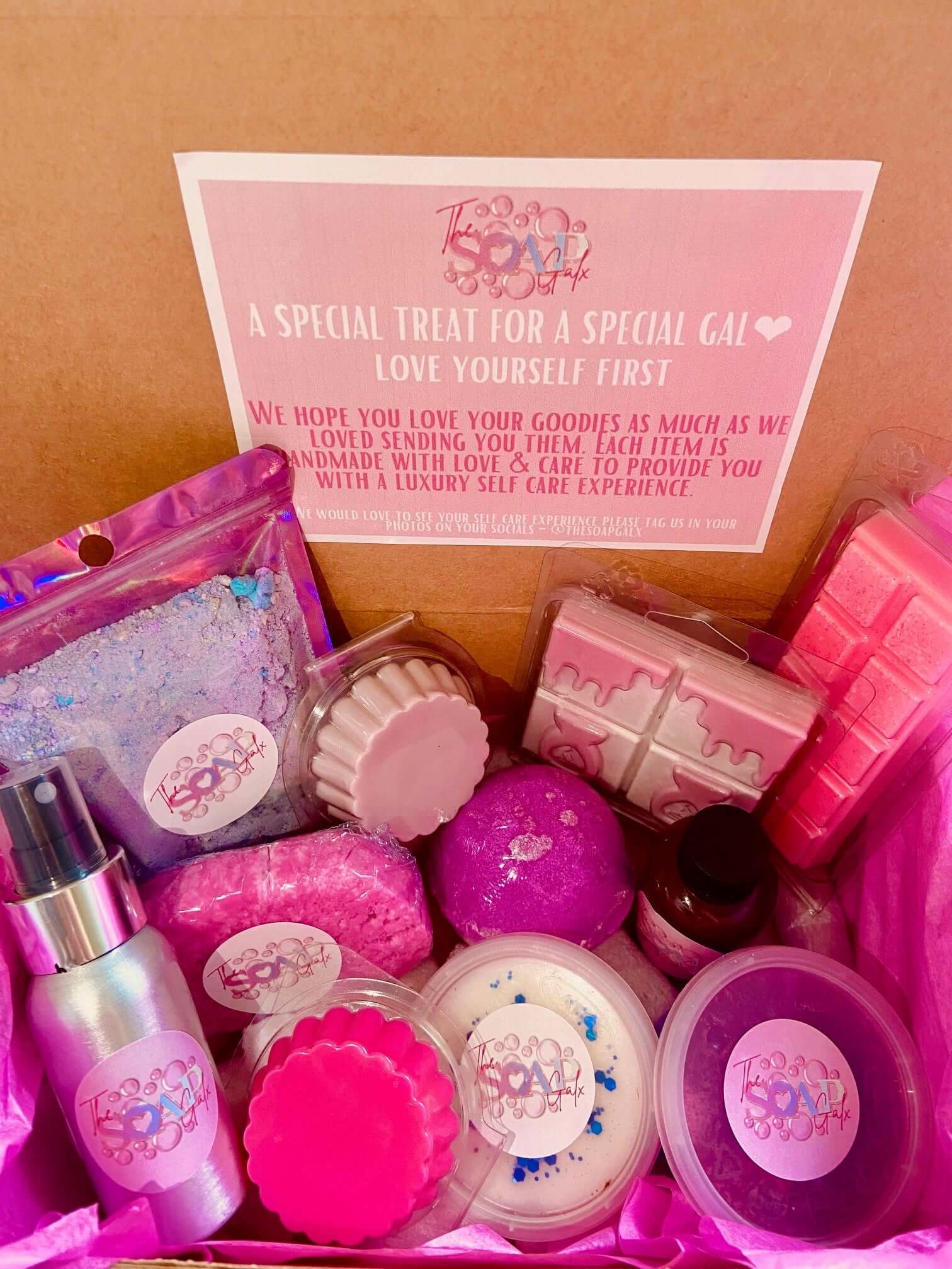 A Mystery Box containing a variety of skincare and bath products by The Soap Gal x.