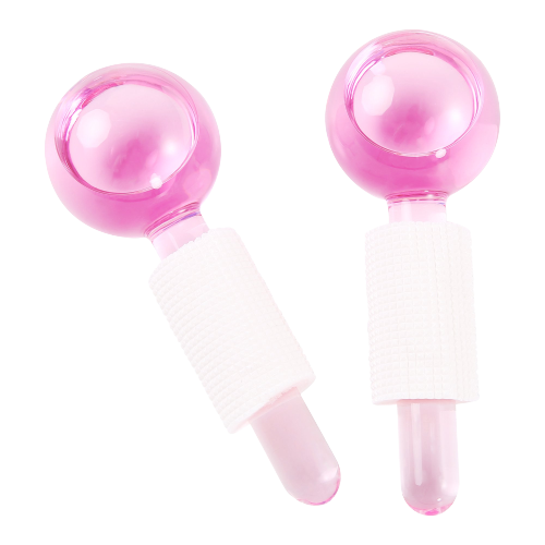 Two pink baby rattles with Cooling Facial Massage Ice Globes 2 Pack-inspired, transparent spherical tops and textured white handles, isolated on a white background by The Soap Gal x.