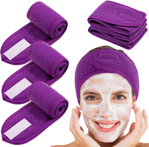 A woman with a purple microfiber Spa Facial Super Soft Make Up Velcro Closure Stretch Towel Headband on her head from The Soap Gal x.
