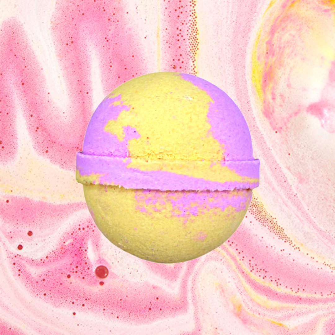 Raspberry Lemonade Bath Bomb by The Soap Gals on a pink marbled background.